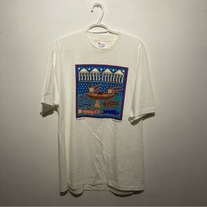 Vintage Graphic Tee with Blue and Orange Design